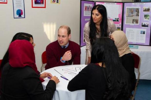 Bradford Telegraph and Argus:  Sofia Buncy, right, with the Duke of Cambridge during his visit to the Khidmat Centre, Bradford, two years ago today