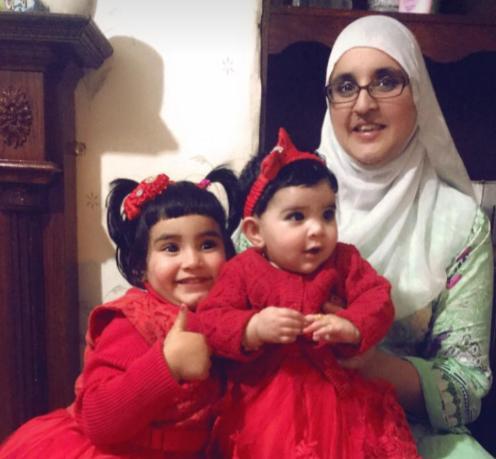 Isma with her two young daughters