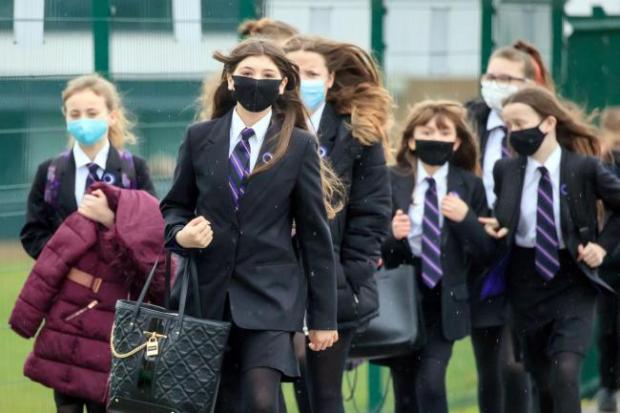 As of yesterday, staff and pupils across the country were no longer advised to wear face coverings in classrooms. Picture: PA