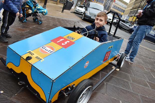Bradford Telegraph and Argus: Harley Amber of Holme Wood tries out a soapbox cart for size