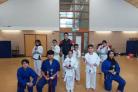 Students at the The United Martial Arts Academy, Zaynab Zamoord  (pictured centre- row one) winning gold in the junior white belt category