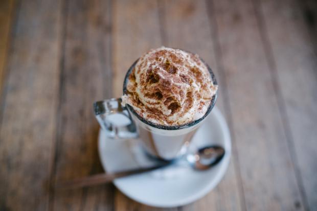 Bradford Telegraph and Argus: A hot chocolate topped with cream and sprinkles (Canva)
