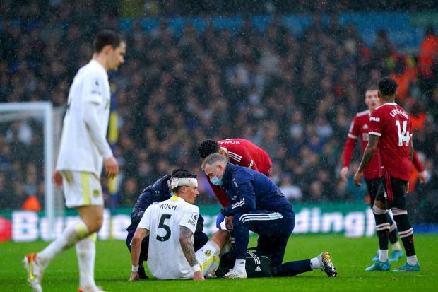 Leeds United's Robin Koch goes down injured for a second time before being substituted during the Premier League match at Elland Road against Manchester United yesterday. Picture: Mike Egerton/PA Wire.