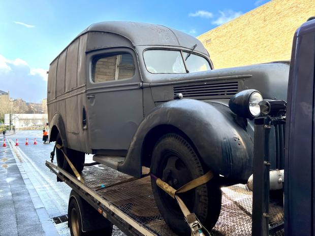 Bradford Telegraph and Argus: A vintage van on The Crown film set in Bradford's Canal Road. Picture: Mark Davis