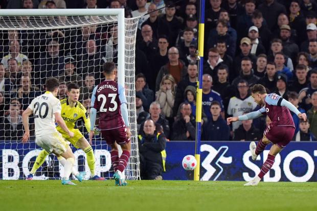 Matty Cash (right) scores Aston Villa's second goal against Leeds at Elland Road last night. Picture: Tim Goode/PA Wire.