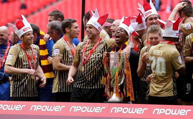 Bradford Telegraph and Argus: City celebrate victory in the 2012/13 League Two play-off final. Picture: PA.