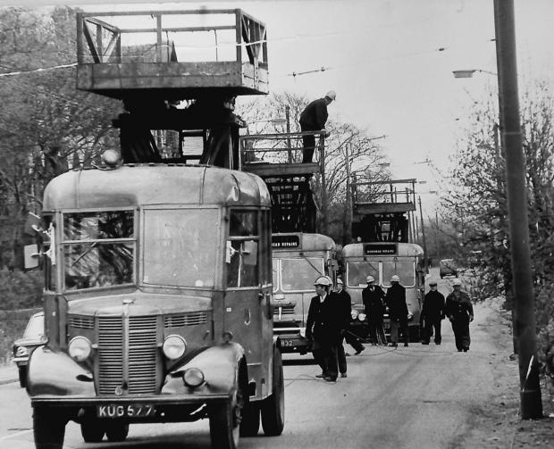 Bradford Telegraph and Argus: Work continues to remove overhead trolleybus wires in April 1972 - a sad sight for the many people who loved the buses 