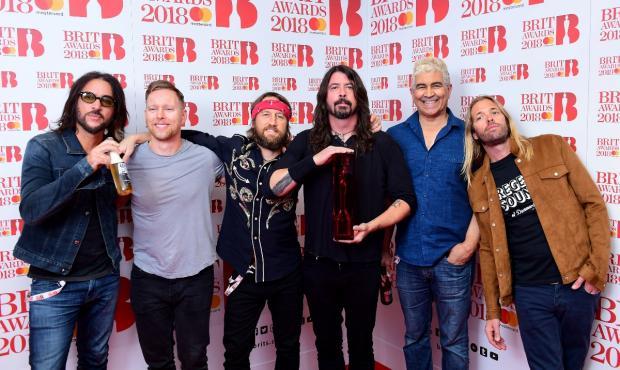 Bradford Telegraph and Argus: Foo Fighters with their award for Best International Group during the 2018 Brit Awards (PA).