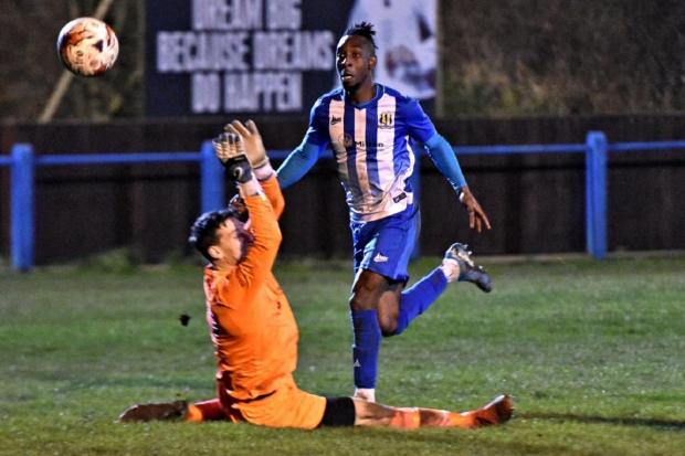 Sumaili Cissa (blue) will be dreaming of promotion to Step Four with Eccleshill United. Pic: Daniel Kerr