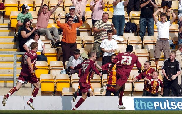 Bradford Telegraph and Argus: Xavier Barrau races to the fans after scoring his second goal against Millwall in 2007