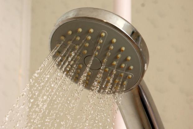 Bradford Telegraph and Argus: Shortening the length of your shower is one way to save money (Canva)