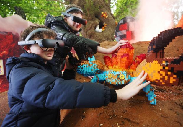 Bradford Telegraph and Argus: Lucca and Sonny using the eSight eyewear as they explored the Magical Forest (LEGOLAND Windsor)