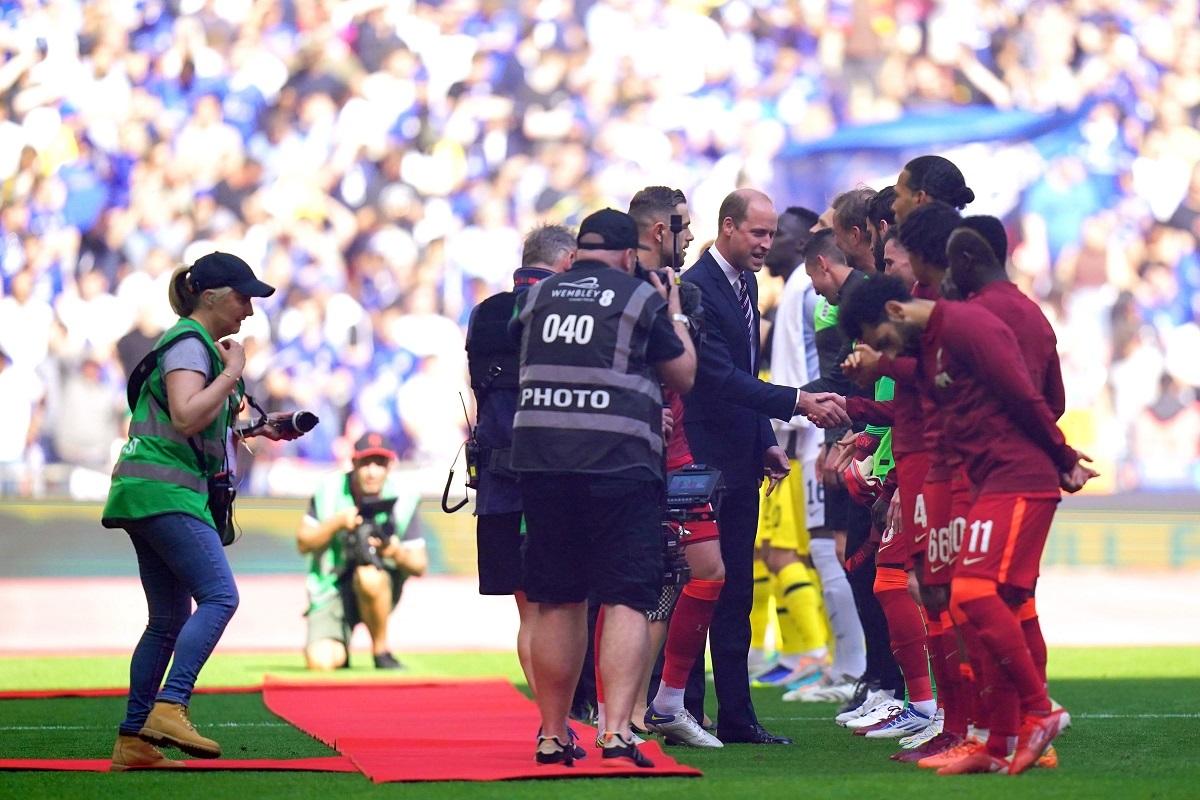 The Duke of Cambridge shakes hands with Liverpool players ahead of the Emirates FA Cup final. Photo: Adam Davy/PA Wire