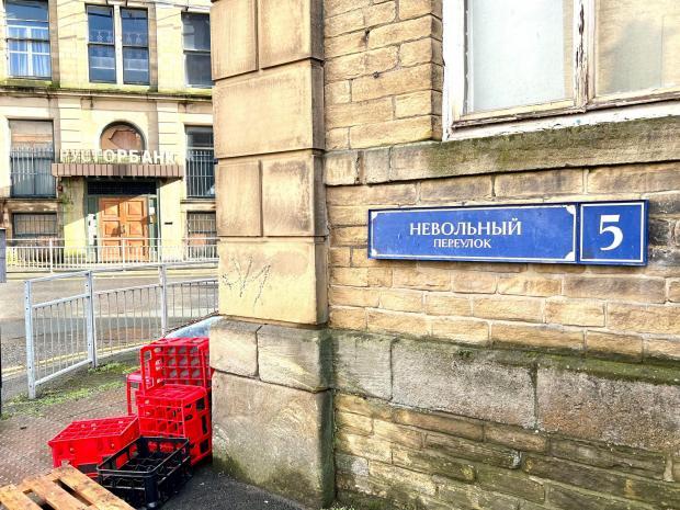 Bradford Telegraph and Argus: A street sign replaced in Holdsworth Street. Picture Mark Davis
