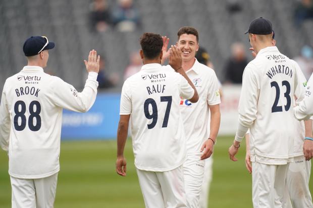 Matthew Fisher, pictured celebrating a wicket against Gloucestershire last month, is currently out with a back injury. Picture: PA.