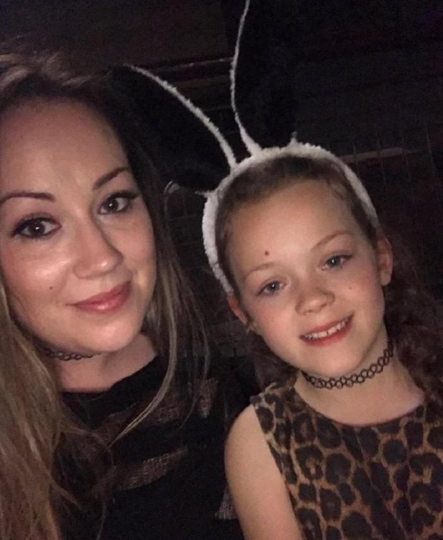 Bradford Telegraph and Argus: Rebecca Reeton with daughter Lillian at the Ariana Grande gig.