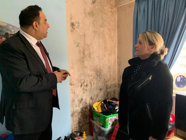 Bradford Telegraph and Argus: Imran Hussain MP with a resident of Waryn House