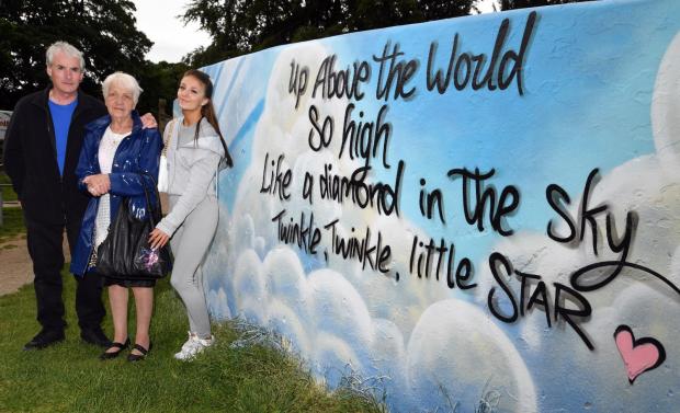Bradford Telegraph and Argus: Star's great-grandparents David Fawcett and Annetta Smith with Alicia Szepler help to unveil the mural in Roberts Park