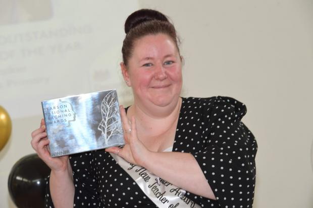 Bradford Telegraph and Argus: Sarah Walker with her award at Carlton Mills Primary