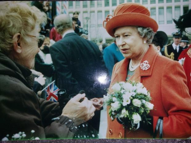 Bradford Telegraph and Argus: orothy Blease meeting the Queen in 1997. “She asked if Mum knew anyone who’d lost someone in the Bradford City fire,” says Dorothy’s daughter, Victoria