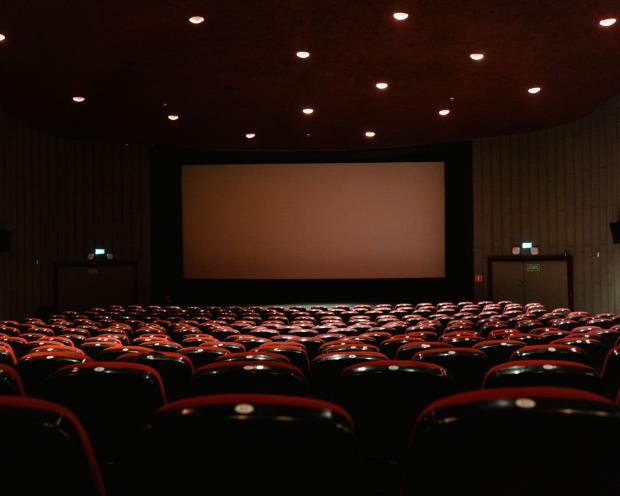 Bradford Telegraph and Argus: During school holidays you can take advantage of cheaper movie screenings. Picture: Canva