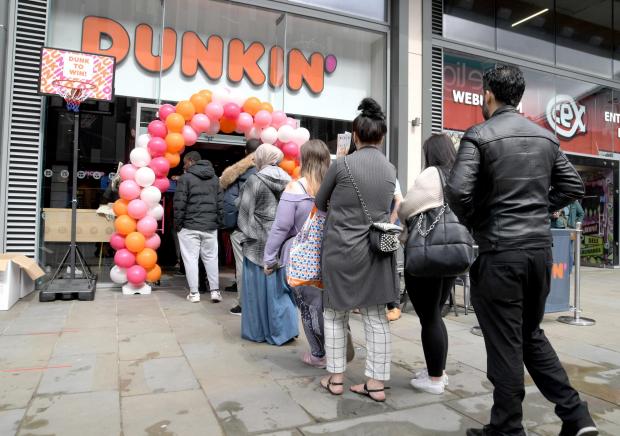 Bradford Telegraph and Argus: Queues formed for people to get a first look at the new store