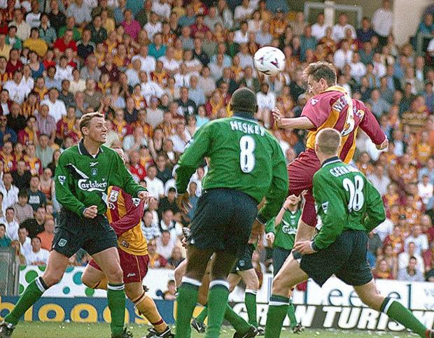 Bradford Telegraph and Argus: David Wetherall heads the winner against Liverpool to keep Bradford City in the Premier League in 2000