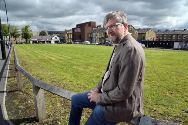 Bradford Telegraph and Argus: Councillor Paul Cook at the site of the proposed health hub in Keighley