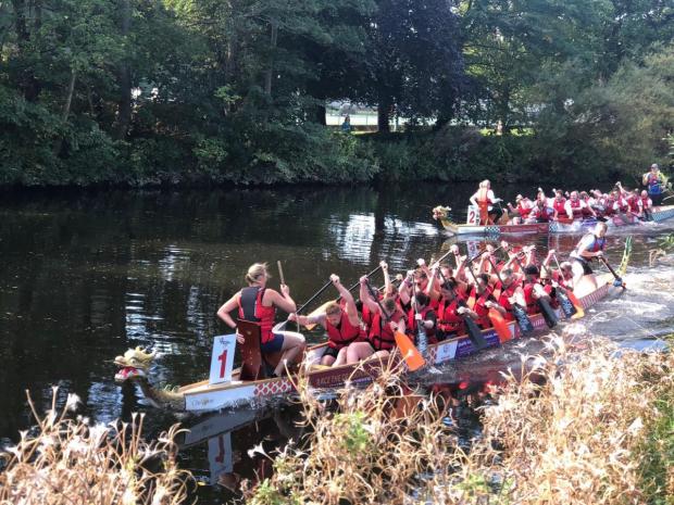 Bradford Telegraph and Argus: A team competes in the 2021 Bradford Dragon Boat Festival.