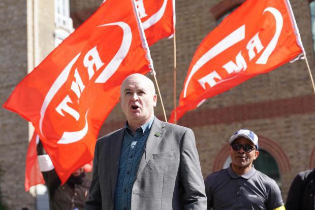 Bradford Telegraph and Argus: RMT general secretary Mick Lynch on a picket line outside King's Cross St Pancras station in London (PA)