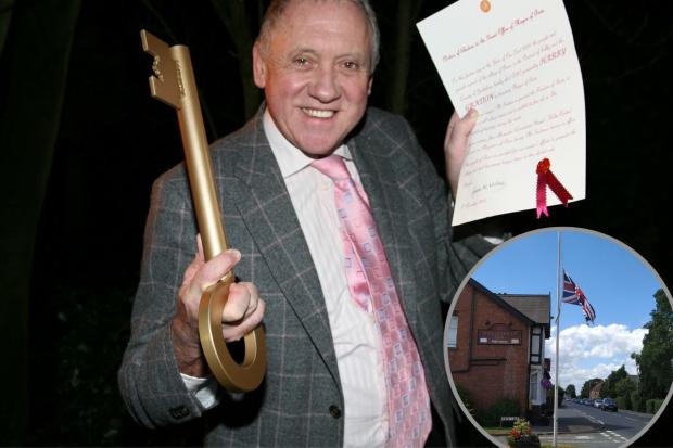 Bradford Telegraph and Argus: Harry with the keys to the village of Burn in 2009. Inset: The village's flag at half mast following his death last month 