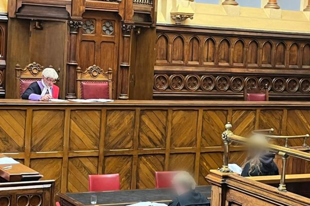 Bradford Telegraph and Argus: Judge Jonathan Rose during a mock sentencing exercise during the SPRUCE programme for sixth formers