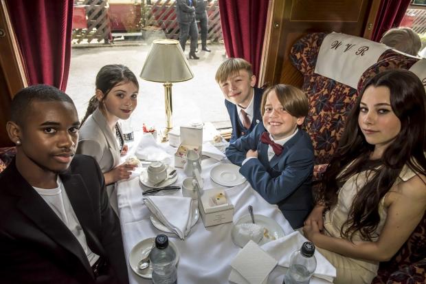 Bradford Telegraph and Argus: The young cast on board the train 