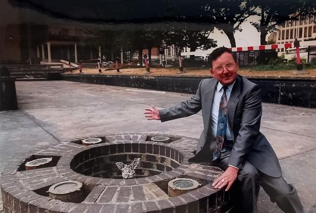 Bradford Telegraph and Argus: Cllr Tony Cairns at the dried-up fountain at Bradford's Tyrls in August 1995