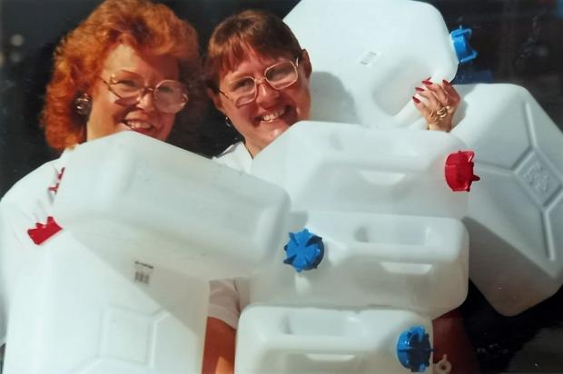 Bradford Telegraph and Argus: Bernadette Hepworth and Linda Turner with a stock of water carriers at Milletts in summer 1995