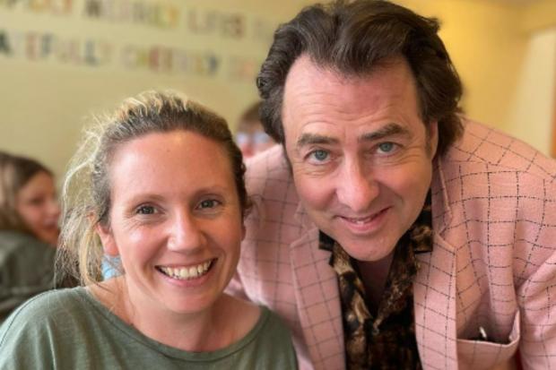 Bradford Telegraph and Argus: Pet portrait artist Amy Mckimm meets Jonathan Ross during his trip to Haworth. Picture: Amy Mckimm