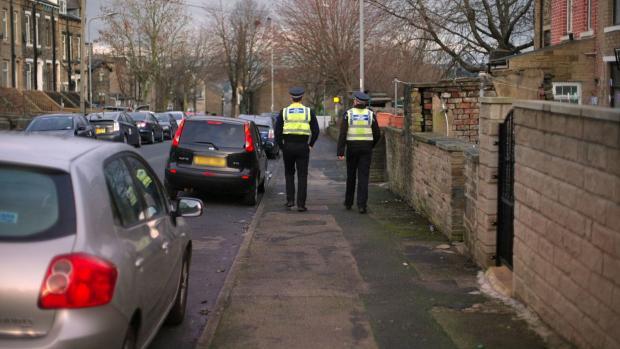 Bradford Telegraph and Argus: Officers patrolling streets in the programme