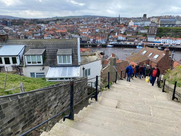 Bradford Telegraph and Argus: On Whitby's famous 99 steps looking out over the harbour