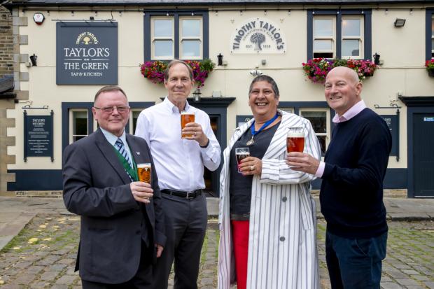 Bradford Telegraph and Argus: From left, deputy mayor Cllr John Kirby, Taylor's chief executive Tim Dewey, Cllr Julie Adams and Taylor's estate operations director Paul Turner