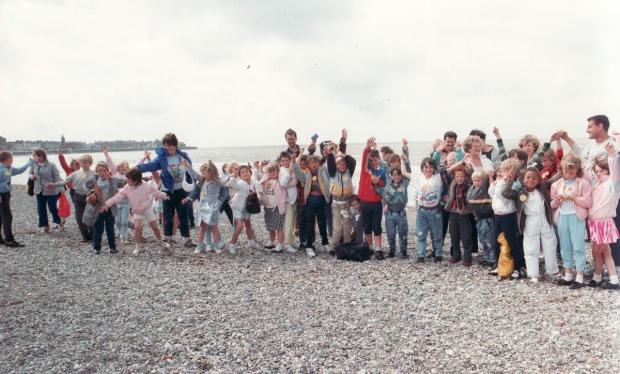 Bradford Telegraph and Argus: Excited youngsters from a Bradford playscheme hit the beach back in 1988