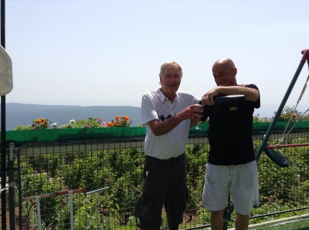 Bradford Telegraph and Argus: Chris, left, tasting wine at the Kascelan family farm in Montenegro 