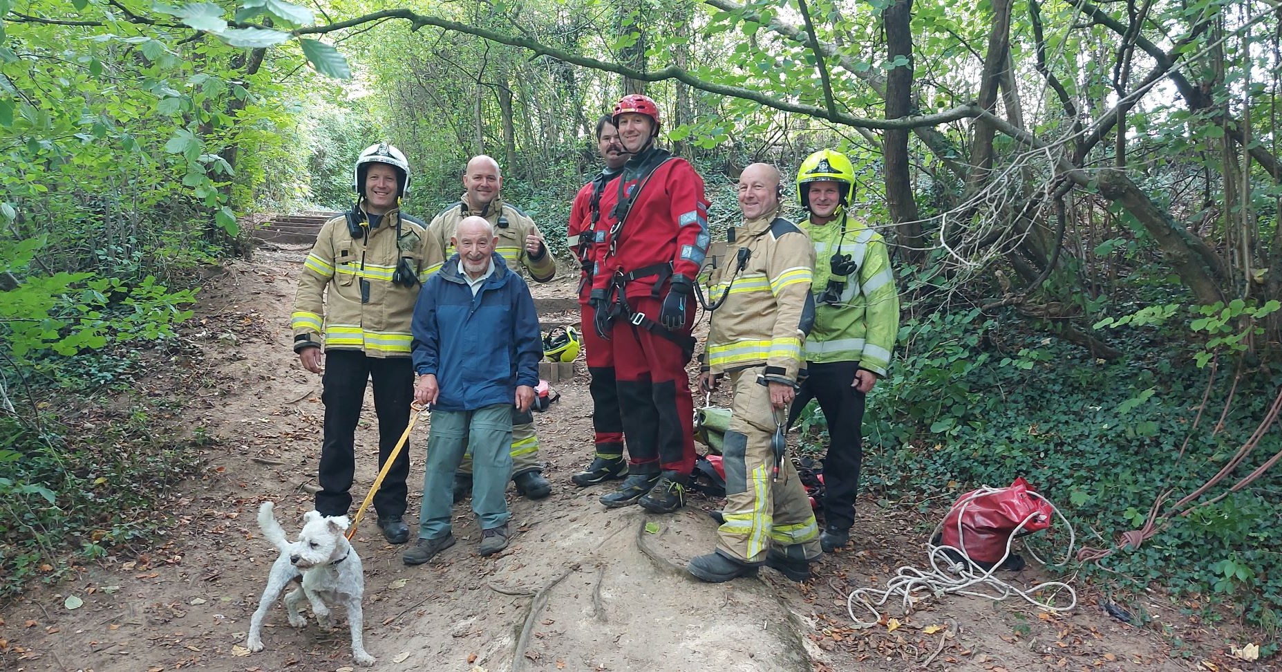 Fire service saves woman who dived into water to search for pet