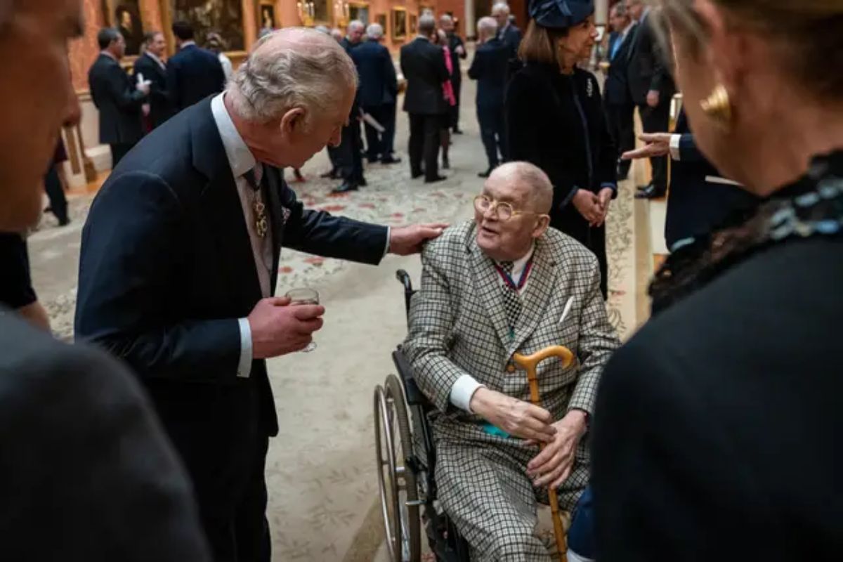 Artist David Hockney meets King Charles III at palace event