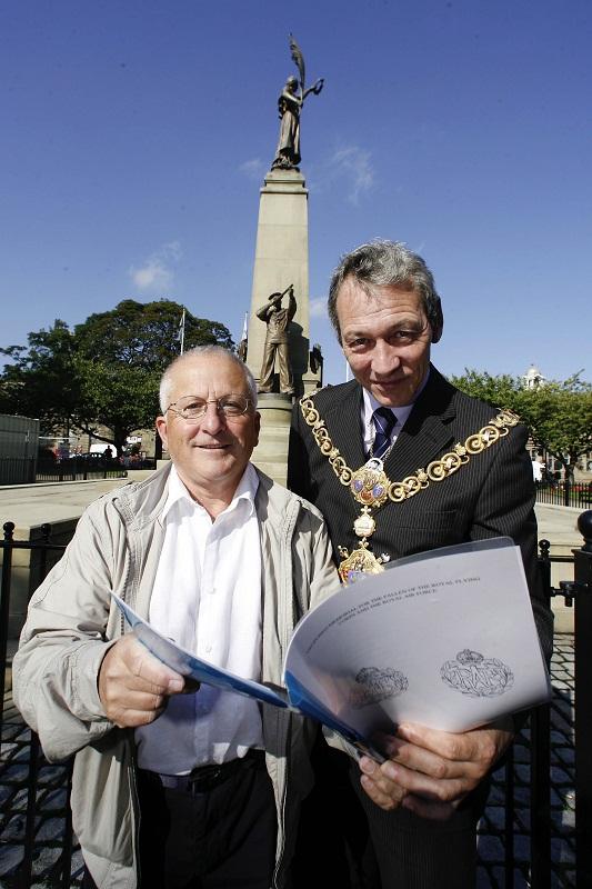 Ian Walkden and Keighley town mayor Councillor Michael Westerman look at plans for an RAF plaque on the town's war memorial