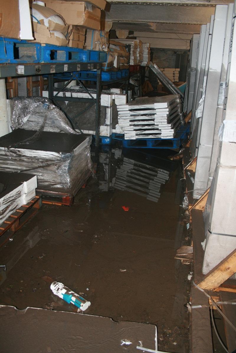 Picture taken by staff at Royce Morgan after the burst water pipe on White Abbey Road caused damage to the Narang Group's offices and stock.