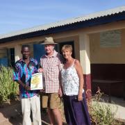 Steve and Hilary Lawther with George Gomez, headteacher at Kumbija, The Gambia