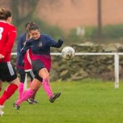 Avenue's Sam Woodham (navy and cerise) had a good game at Altofts, but her team ended up losing 3-0 Picture: Steve Biltcliffe