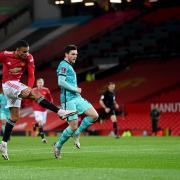 Mason Greenwood (left) scores Manchester United's opener in their 3-2 win over Liverpool in the FA Cup fourth round last month. Picture: Laurence Griffiths.