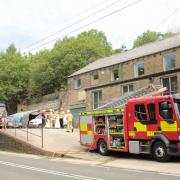Firefighters extinguished a fire at industrial premises at Oxenhope this afternoon. Picture: Glynn Beck
