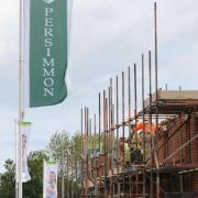 Workers on a Persimmon Homes site